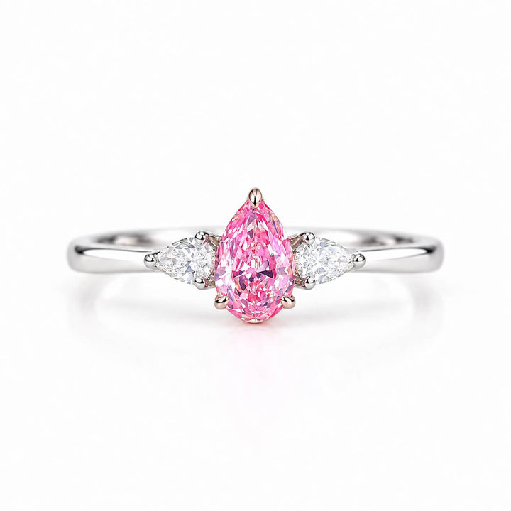 Pear cut lab grown pink diamond three stones engagement ring