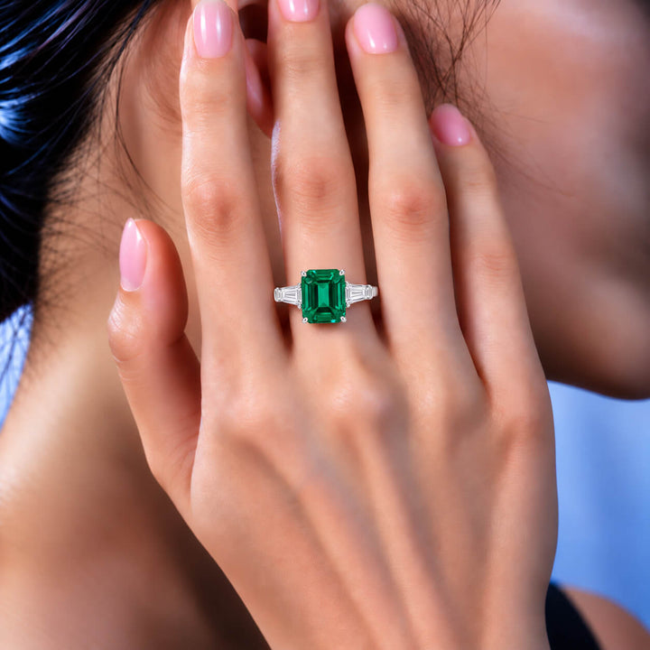 Emerald cut lab grown emerald three stones engagement ring