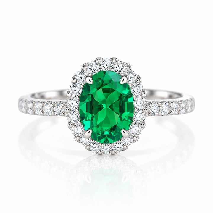 Halo setting oval cut lab grown emerald engagement ring