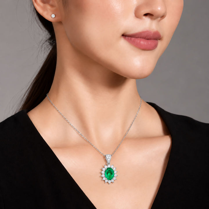 Halo setting oval cut lab grown emerald pendant necklace