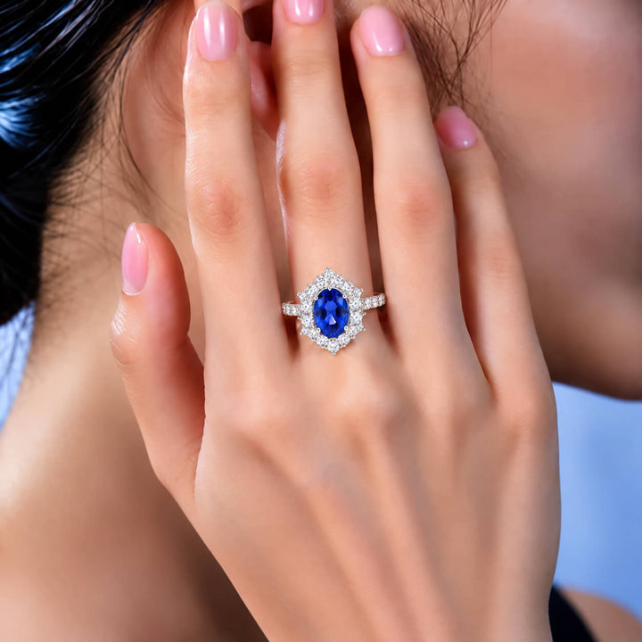 Halo setting oval cut  lab grown sapphire engagement ring