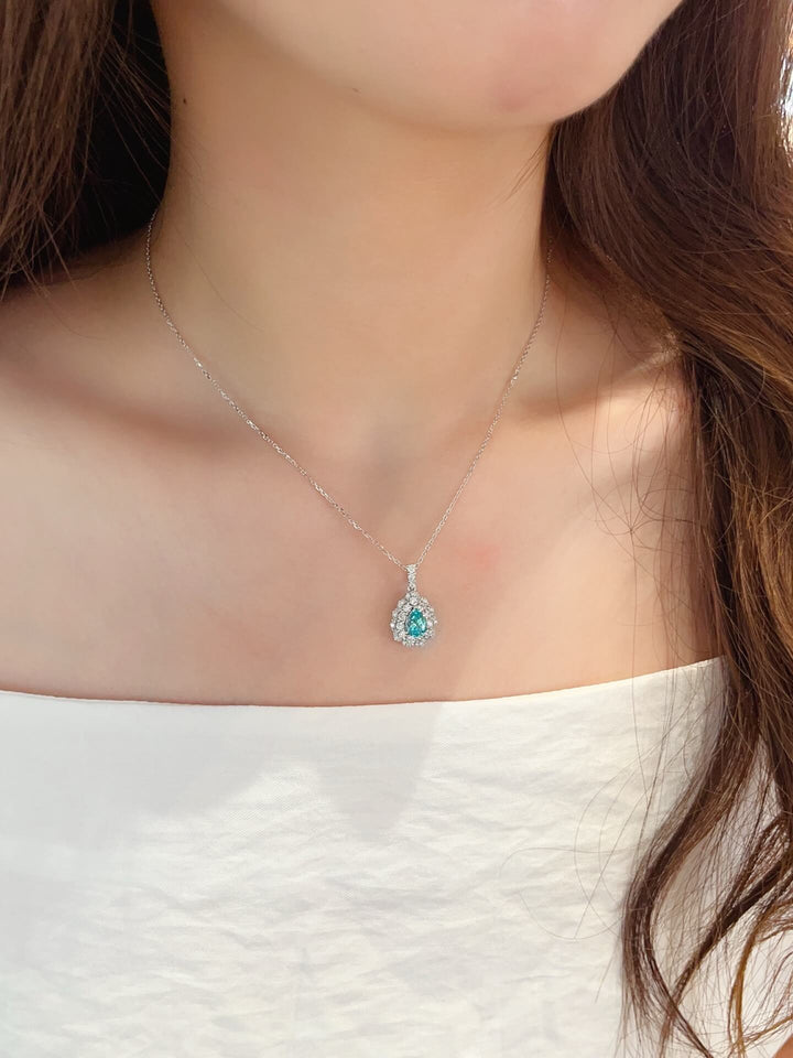 Halo setting pear cut lab grown paraiba pendant necklace