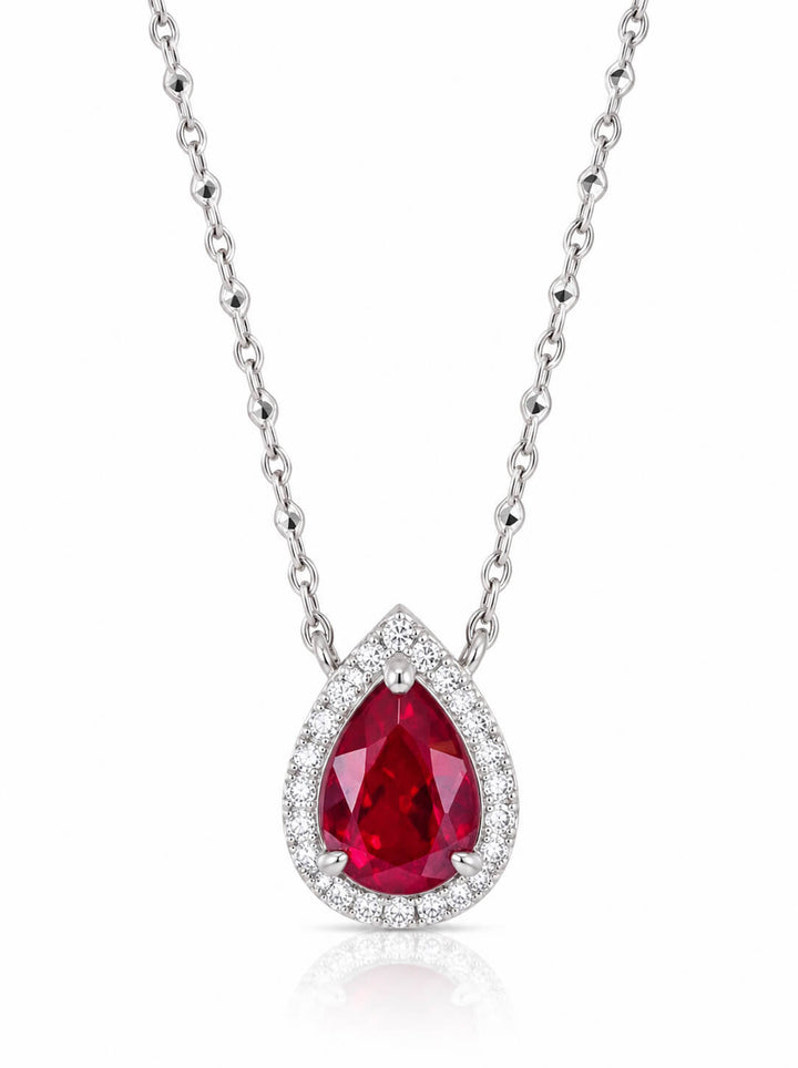 Halo setting pear cut lab grown ruby pendant necklace