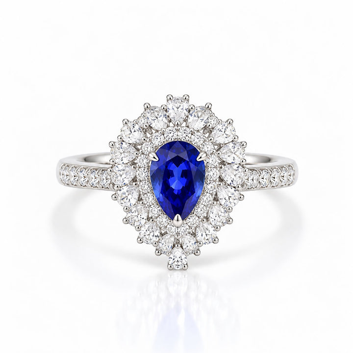 Halo setting pear cut  lab grown sapphire engagement ring