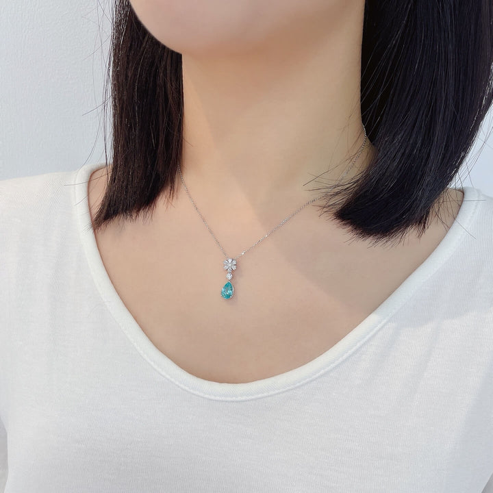 Snowflower design pear cut lab grown paraiba pendant necklace